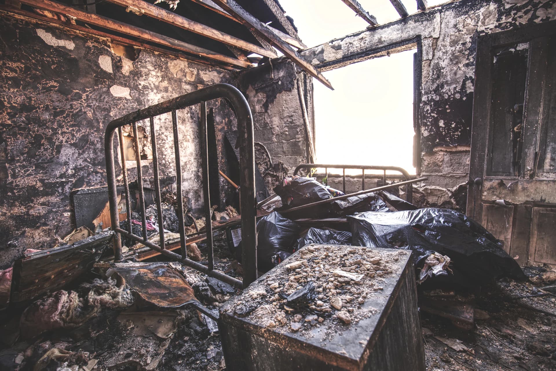 Fire and smoke damage restoration crew assessing a residential structure