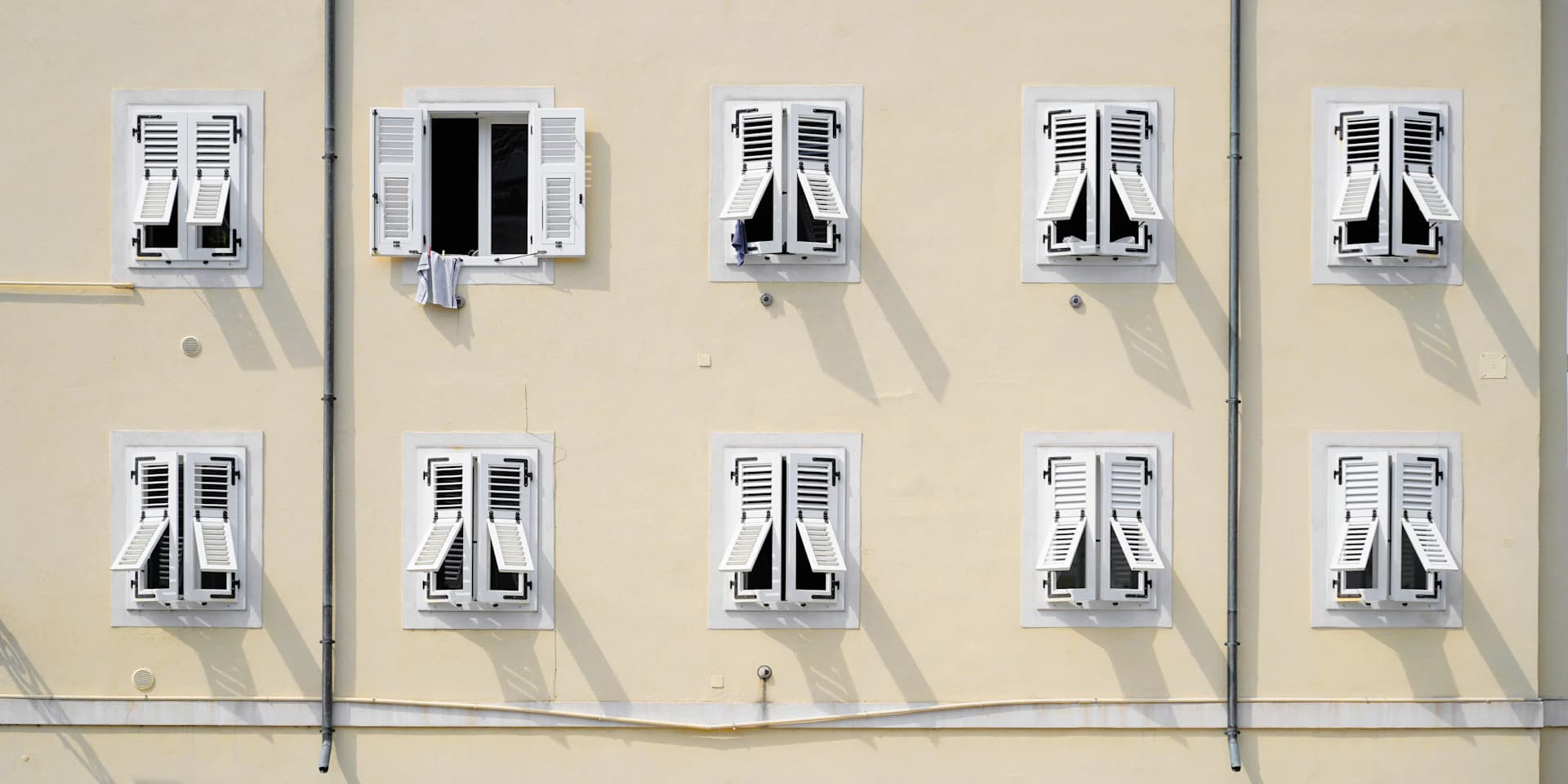 Licensed electrician installing a new 200-amp residential electrical panel